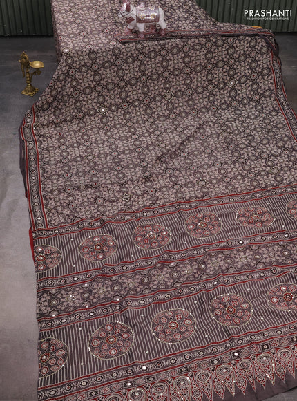 Muslin silk saree grey shade and maroon with allover ajrakh prints and sequin mirror work embroidery pallu