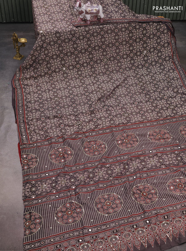 Muslin silk saree grey shade and maroon with allover ajrakh prints and sequin mirror work embroidery pallu
