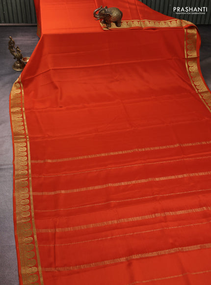 Pure mysore silk orange with plain body and zari woven border