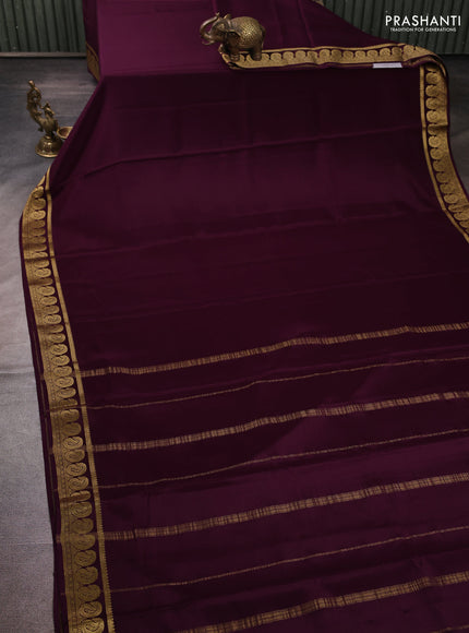 Pure mysore silk wine shade with plain body and zari woven border