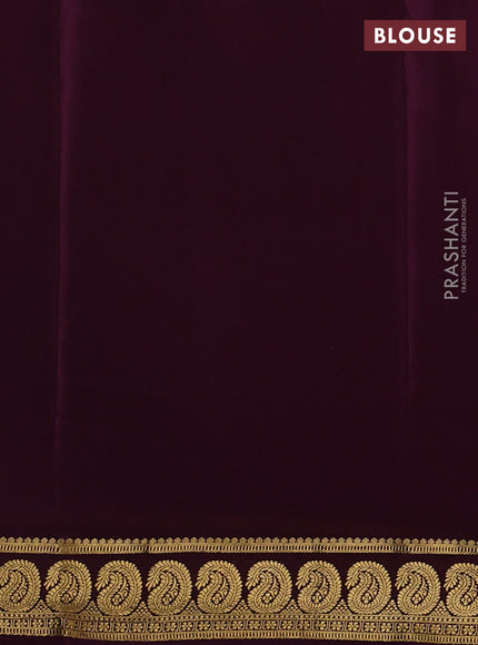 Pure mysore silk wine shade with plain body and zari woven border