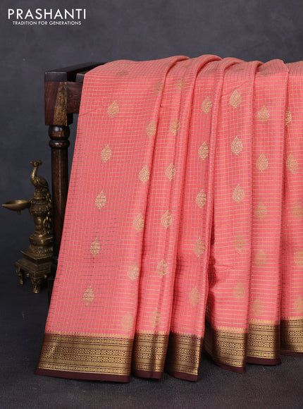 Pure mysore silk peach shade and coffee brown with allover small zari checks & buttas and zari woven border
