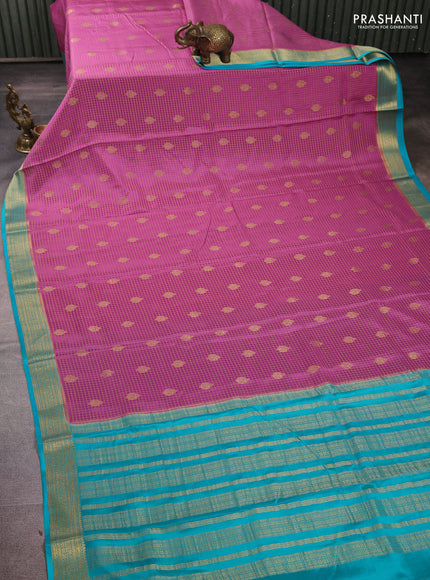 Pure mysore silk mauve pink and cs blue with allover small zari checks & buttas and zari woven border