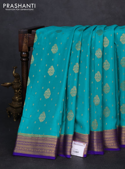 Pure mysore silk teal blue and violet with allover zari woven buttas and zari woven butta border