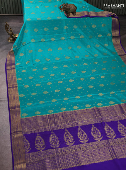 Pure mysore silk teal blue and violet with allover zari woven buttas and zari woven butta border