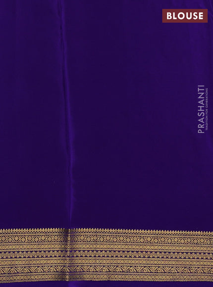 Pure mysore silk teal blue and violet with allover zari woven buttas and zari woven butta border