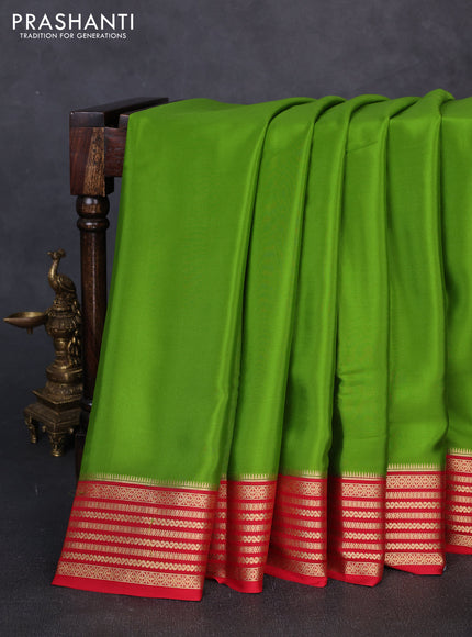Pure mysore silk light green and red with plain body and zari woven border