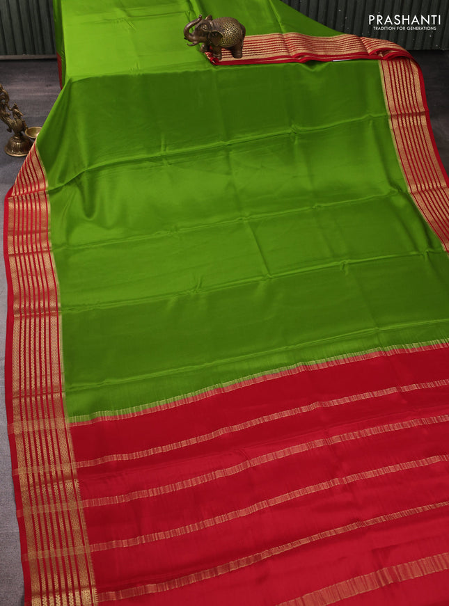 Pure mysore silk light green and red with plain body and zari woven border