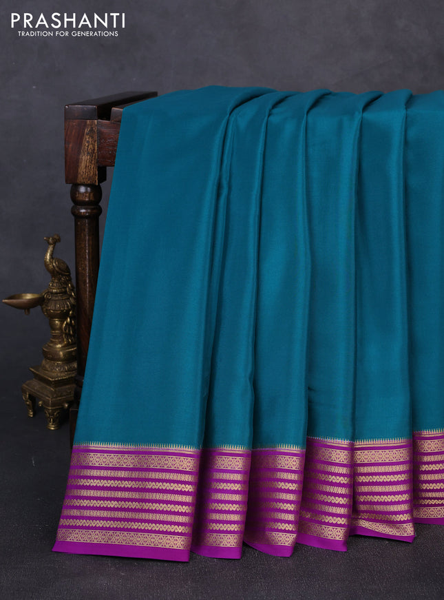 Pure mysore silk peacock green and purple with plain body and zari woven border