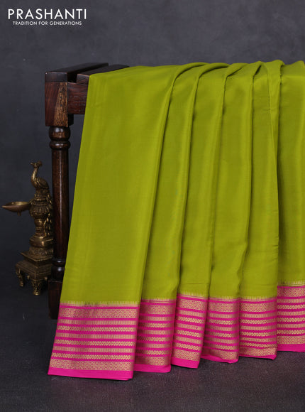 Pure mysore silk mehendi green and pink with plain body and zari woven border