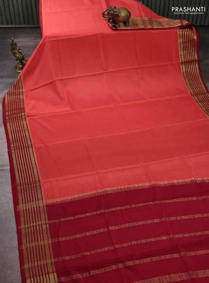 Pure mysore silk peach shade and maroon with plain body and zari woven border