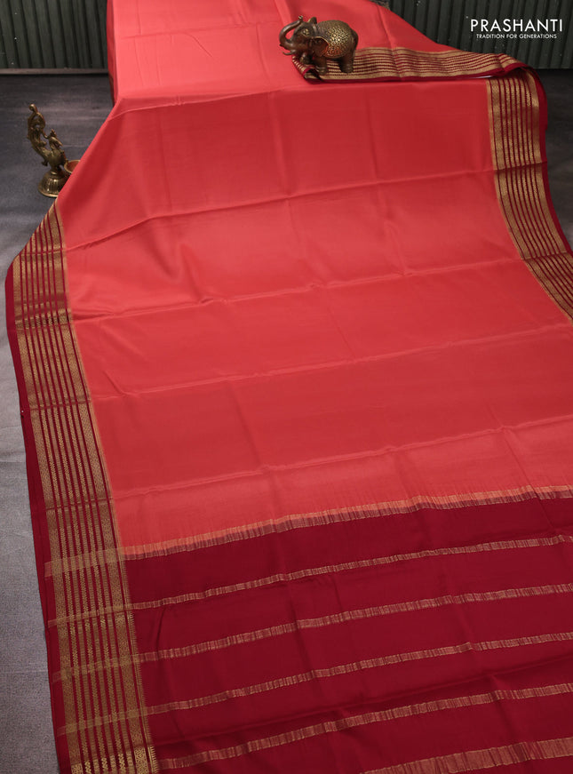 Pure mysore silk peach shade and maroon with plain body and zari woven border