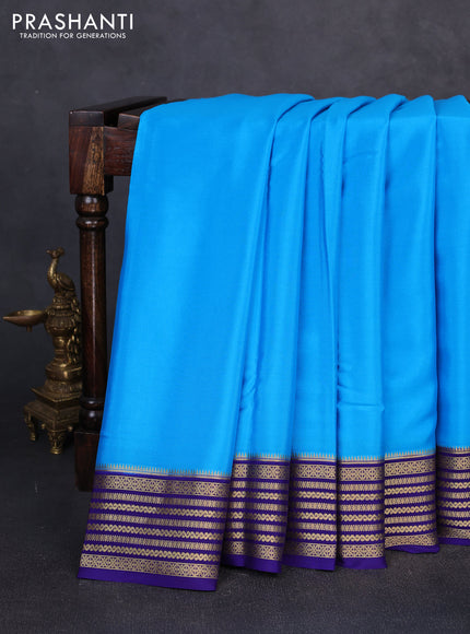 Pure mysore silk cs blue and blue with plain body and zari woven border