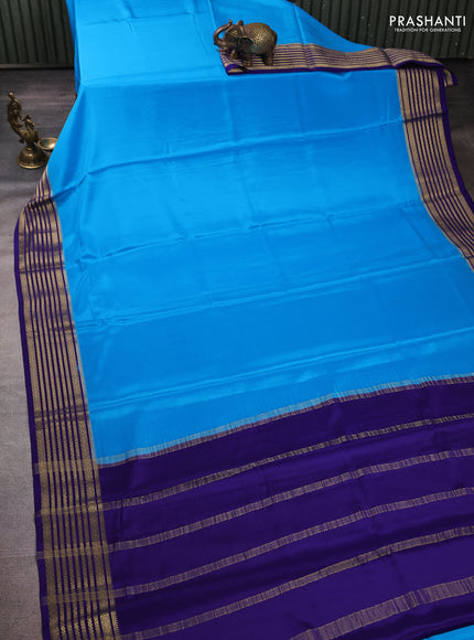 Pure mysore silk cs blue and blue with plain body and zari woven border