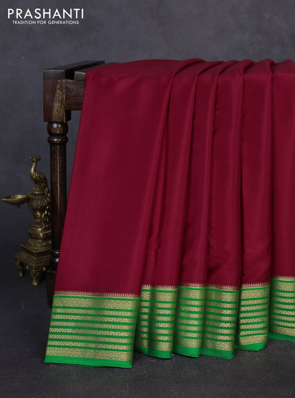 Pure mysore silk maroon and green with plain body and zari woven border
