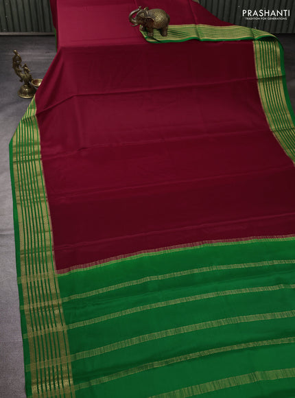 Pure mysore silk maroon and green with plain body and zari woven border