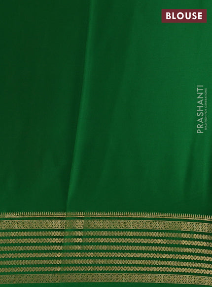 Pure mysore silk maroon and green with plain body and zari woven border