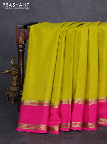 Pure mysore silk lime green and pink with plain body and rettapet zari woven border