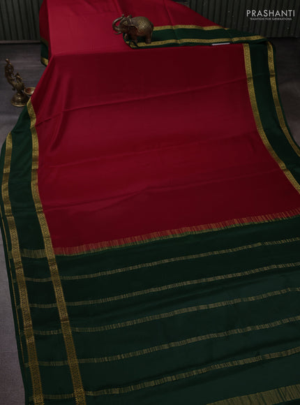 Pure mysore silk maroon and bottle green with plain body and rettapet zari woven border