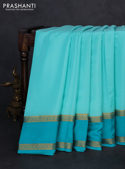 Pure mysore silk pastel teal green and teal green with plain body and rettapet zari woven border