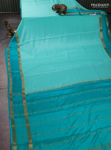 Pure mysore silk pastel teal green and teal green with plain body and rettapet zari woven border
