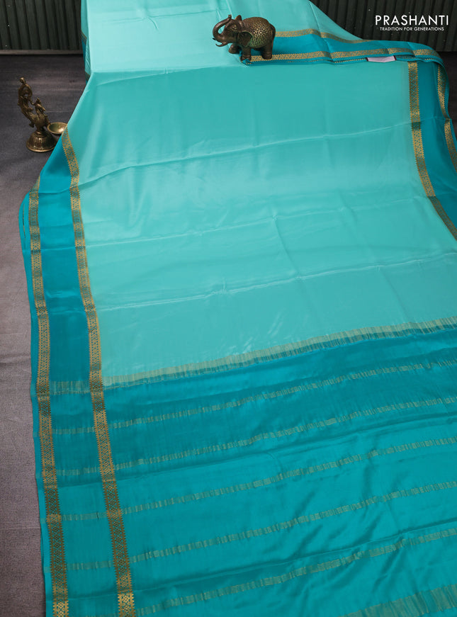 Pure mysore silk pastel teal green and teal green with plain body and rettapet zari woven border