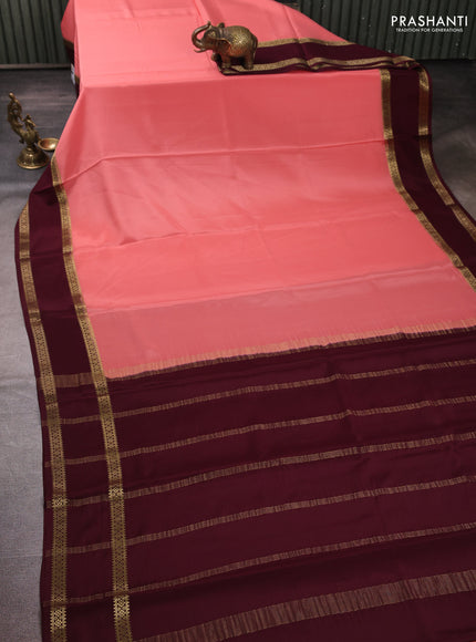 Pure mysore silk peach shade and coffee brown with plain body and rettapet zari woven border