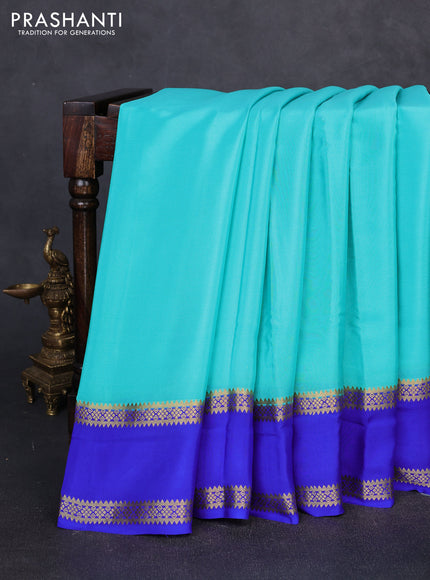 Pure mysore silk teal green and royal blue with plain body and rettapet zari woven border