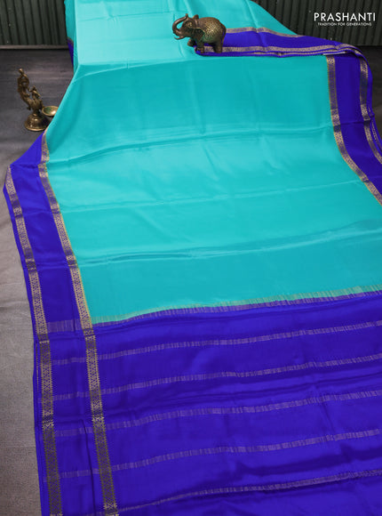 Pure mysore silk teal green and royal blue with plain body and rettapet zari woven border