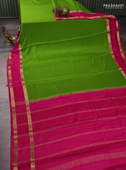 Pure mysore silk light green and pink with plain body and rettapet zari woven border