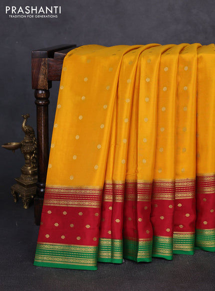 Pure mysore silk mustard yellow and maroon with allover zari woven buttas and rettapet zari woven border