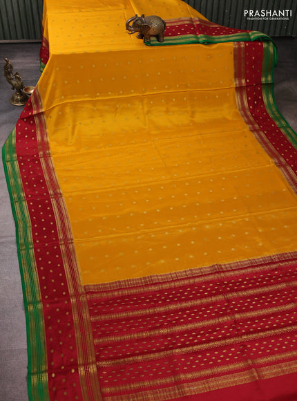 Pure mysore silk mustard yellow and maroon with allover zari woven buttas and rettapet zari woven border