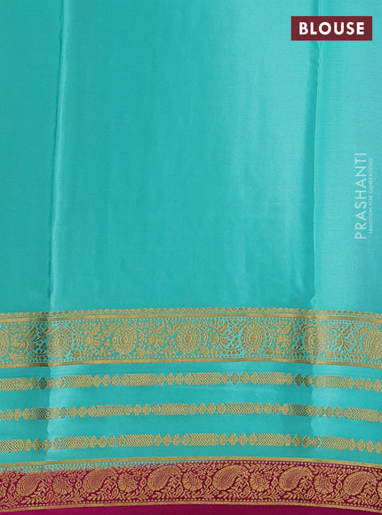 Pure mysore silk violet and teal green with allover zari woven buttas and zari woven border