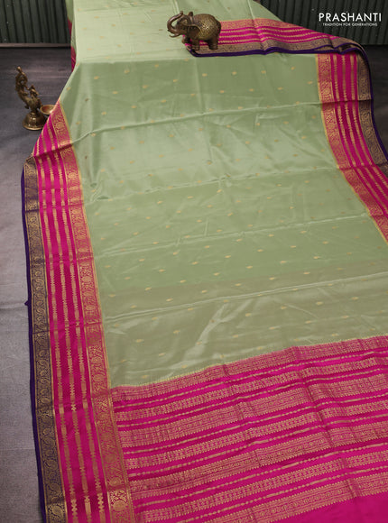 Pure mysore silk pastel green and pink with allover zari woven buttas and zari woven border