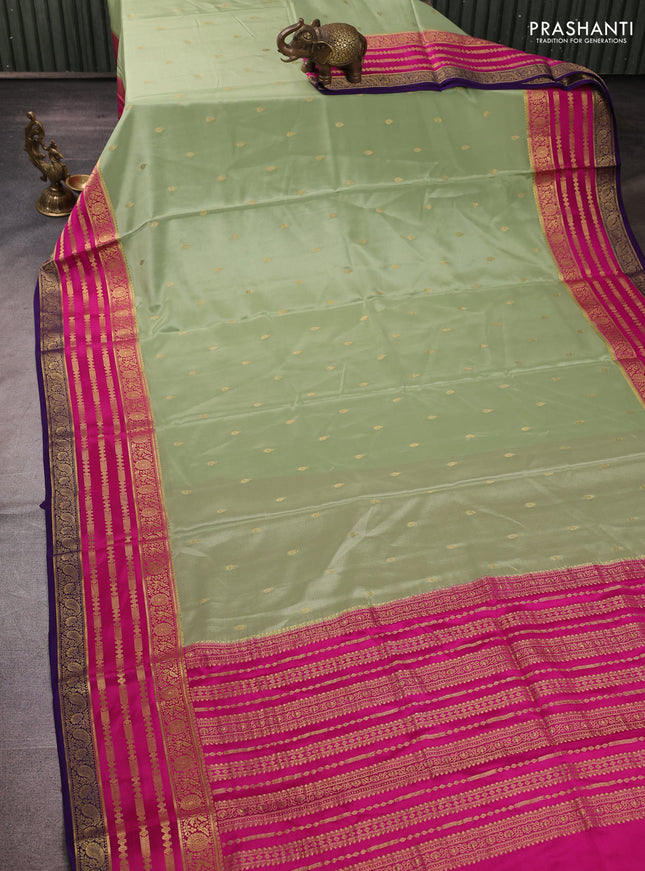 Pure mysore silk pastel green and pink with allover zari woven buttas and zari woven border