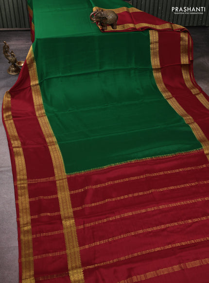Pure mysore silk green and maroon with plain body and rettapet zari woven border