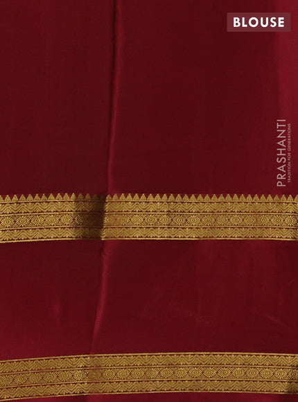 Pure mysore silk green and maroon with plain body and rettapet zari woven border