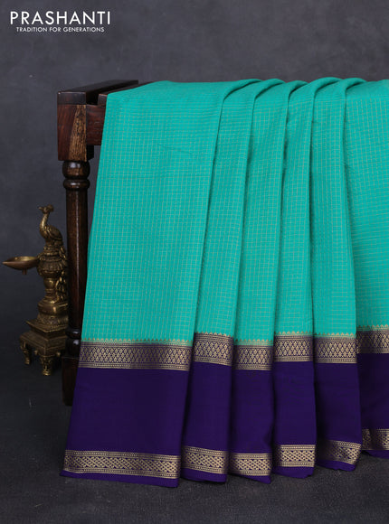 Pure mysore silk teal green and violet with allover small zari checked pattern and rettapet zari woven border