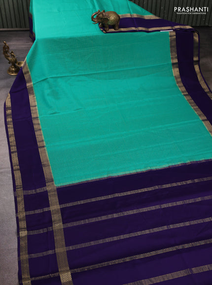 Pure mysore silk teal green and violet with allover small zari checked pattern and rettapet zari woven border