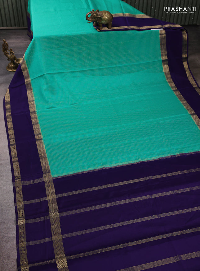 Pure mysore silk teal green and violet with allover small zari checked pattern and rettapet zari woven border