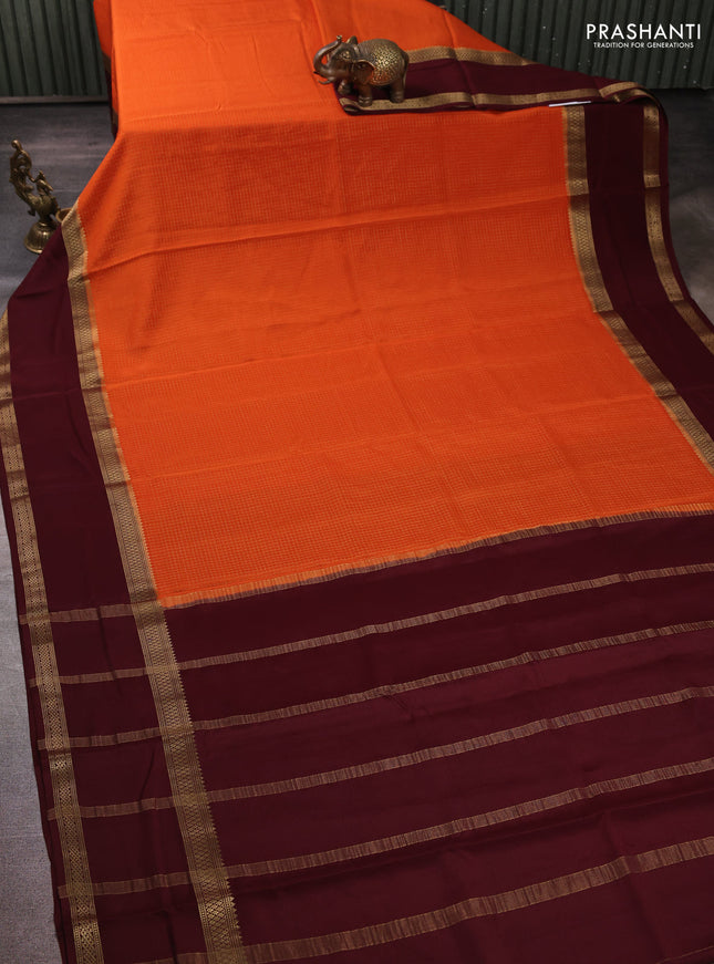 Pure mysore silk rust shade and coffee brown with allover small zari checked pattern and rettapet zari woven border