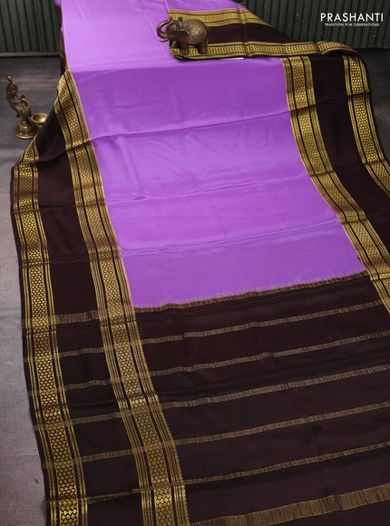 Pure mysore silk lavender and coffee brown with plain body and rettapet zari woven border