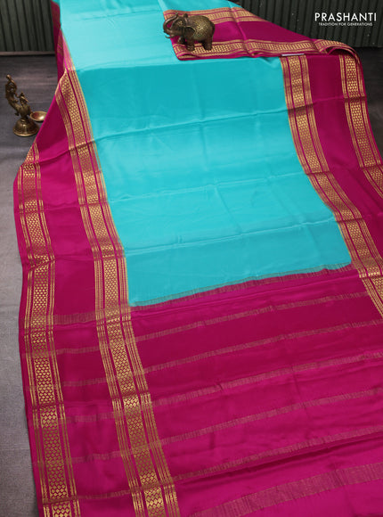 Pure mysore silk teal green and pink with plain body and rettapet zari woven border