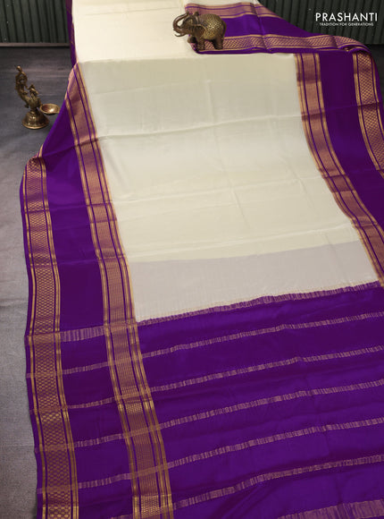 Pure mysore silk cream and purple with plain body and rettapet zari woven border