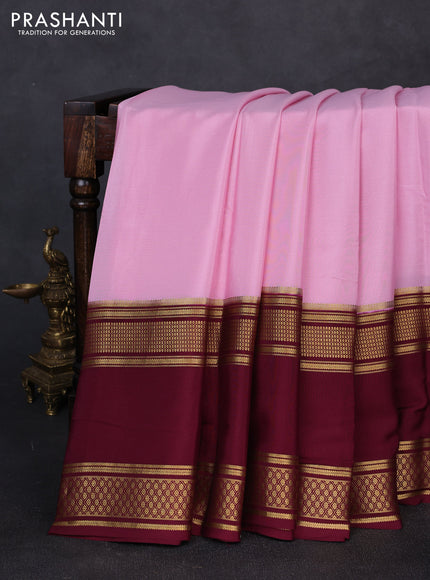 Pure mysore silk pastel pink and deep wine with plain body and rettapet zari woven border
