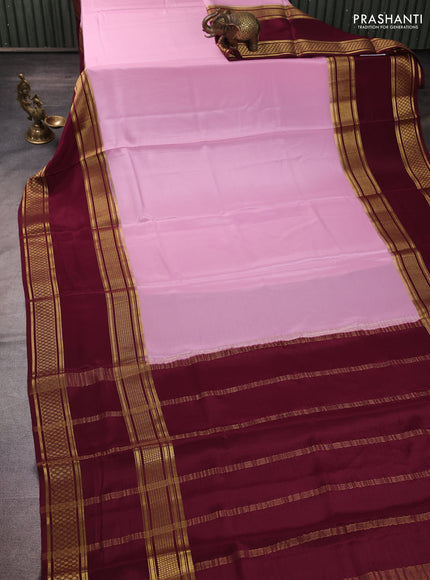 Pure mysore silk pastel pink and deep wine with plain body and rettapet zari woven border