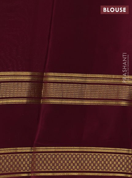 Pure mysore silk pastel pink and deep wine with plain body and rettapet zari woven border