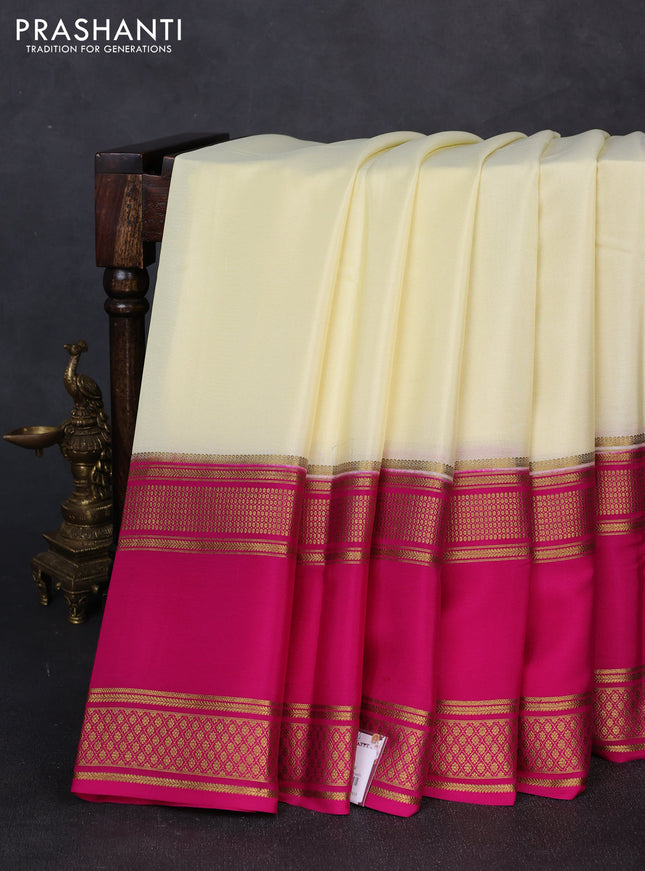 Pure mysore silk cream and pink with plain body and rettapet zari woven border