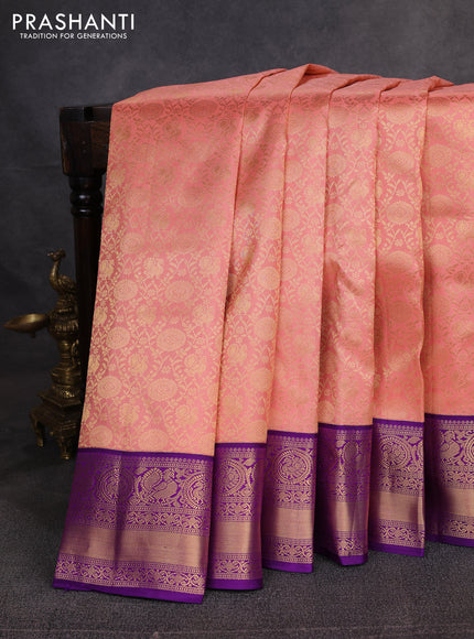 Pure kanchipuram silk saree peach pink and purple with allover zari woven brocade weaves and rich zari woven border