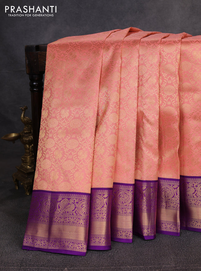 Pure kanchipuram silk saree peach pink and purple with allover zari woven brocade weaves and rich zari woven border